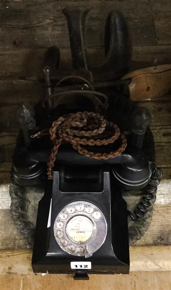 Black bakelite telephone, boot scraper etc